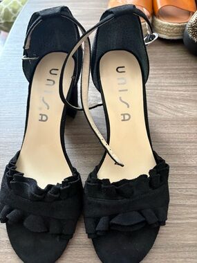 Unisa Black Suede Ruffle Ankle-Strap Heels
